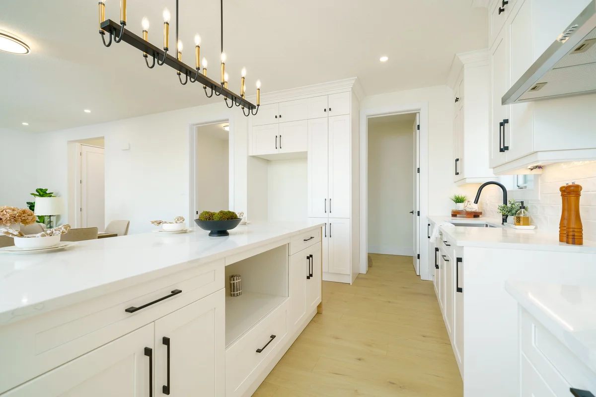 Starlit Homes kitchen detail showing quartz countertop and matte black hardware in Ailsa Craig Ontario