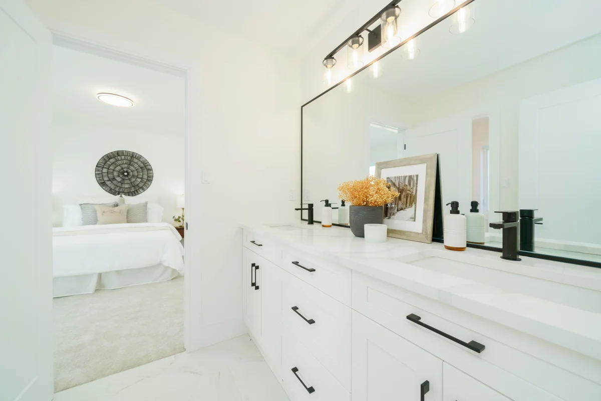 Starlit Homes spacious master bedroom with triple windows in Ausable Bluffs Ailsa Craig Ontario